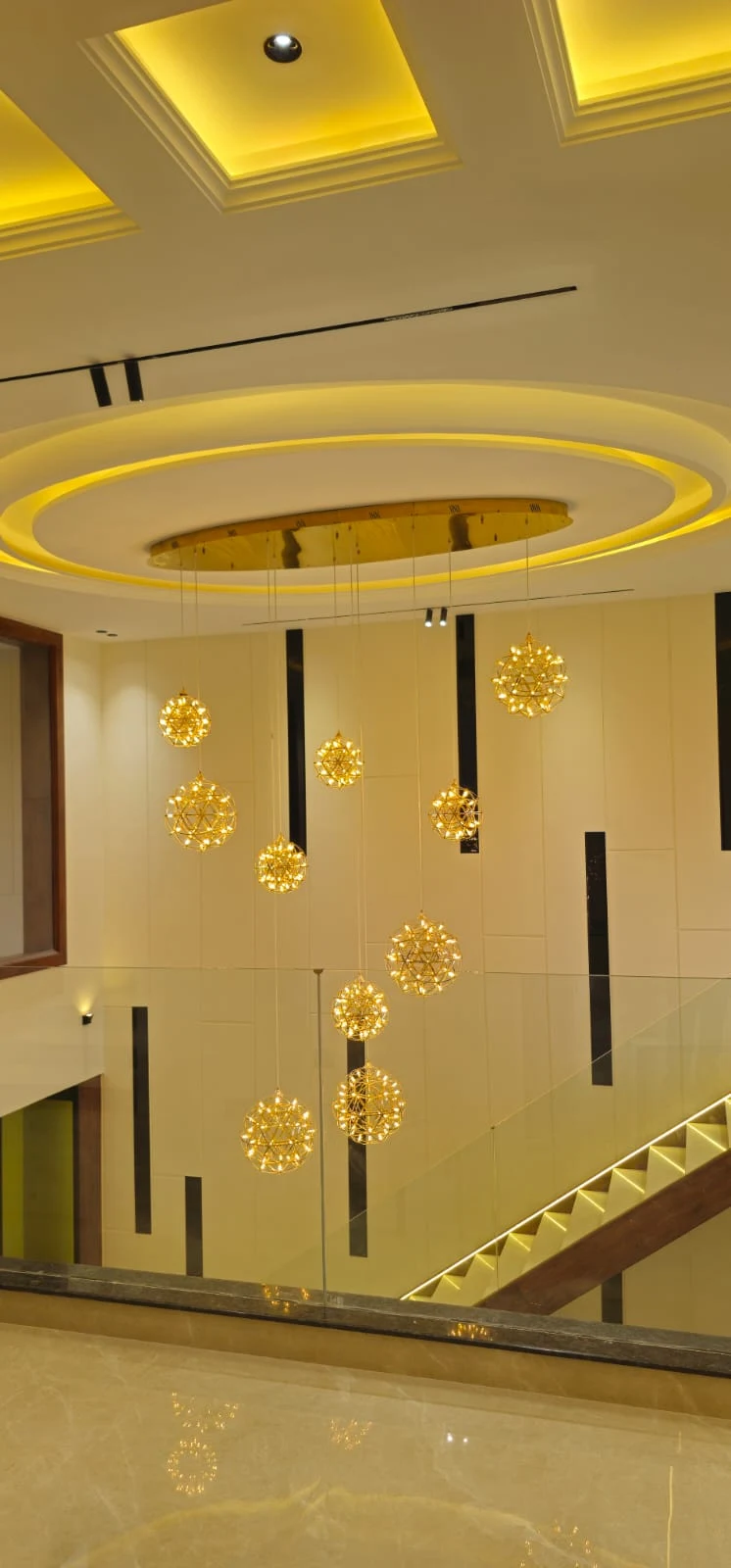 Double-Height Staircase Atrium with Chandelier
